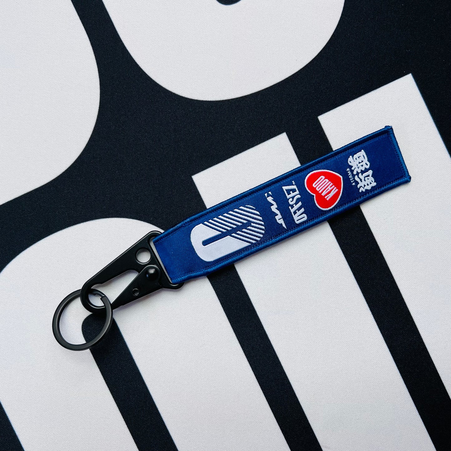 Kaido House jet tag keychain, blue