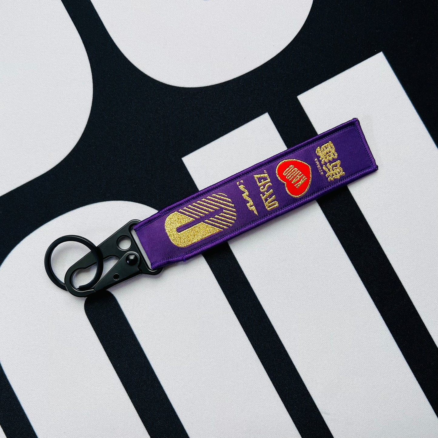 Kaido House jet tag keychain, purple